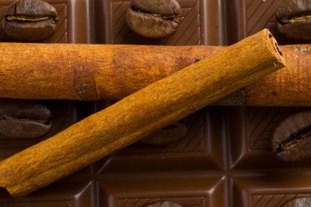 chocolate coffee and cinnamon sticksの写真素材