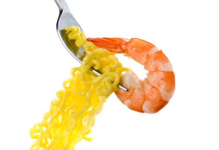 fork with pasta and shrimp isolated on white
の写真素材