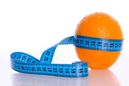 fresh oranges with a measuring tapeの写真素材