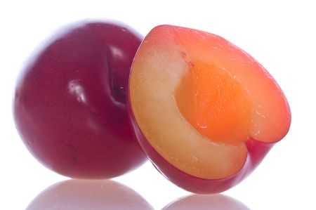 fresh plum on white isolatedの写真素材