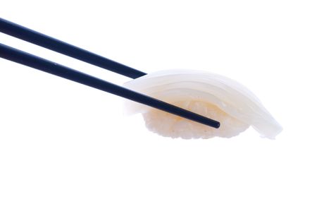 Sushi with chopsticksの写真素材