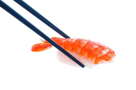 Sushi with chopsticksの写真素材