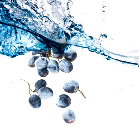 Beautiful splashes a clean water and fruit の写真素材