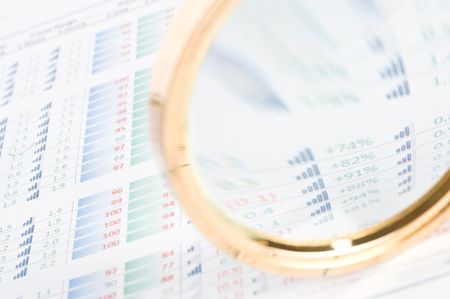 Magnifying glass and diagram の写真素材