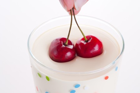 Fresh sweet cherry in cream.