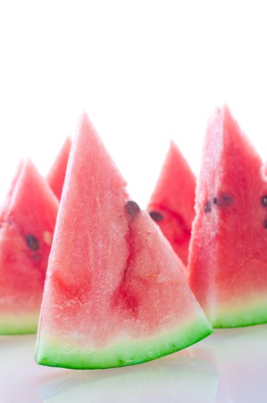 red watermelon over white plateの写真素材