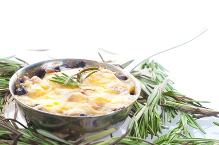 julienne  against rosemary branches.の写真素材