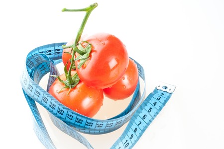 tomato with measurement isolated on whiteの写真素材