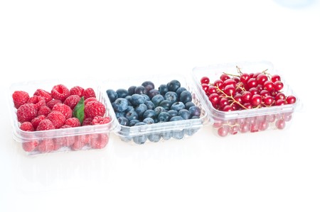 Beautiful raspberries isolated on whiteの写真素材