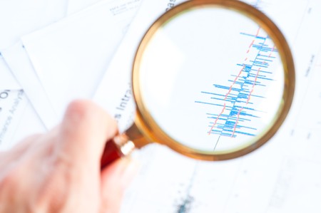 hand holding a magnifying glassの写真素材