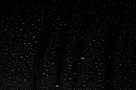 Water drops on metal surfaceの写真素材