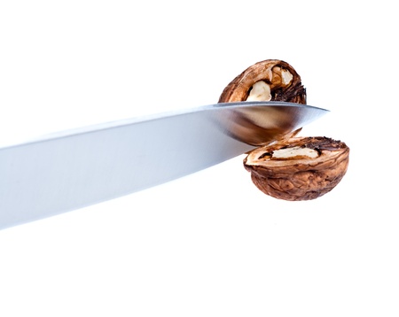 Cutting of fruit by knifeの写真素材