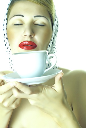 beauty lady is drinking coffeeの写真素材