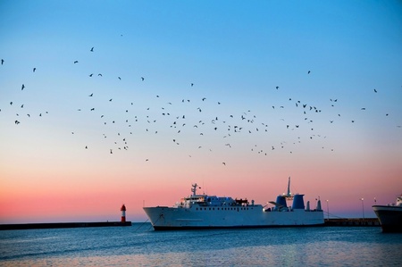 Dawn against the sea and the shipsのeditorial素材