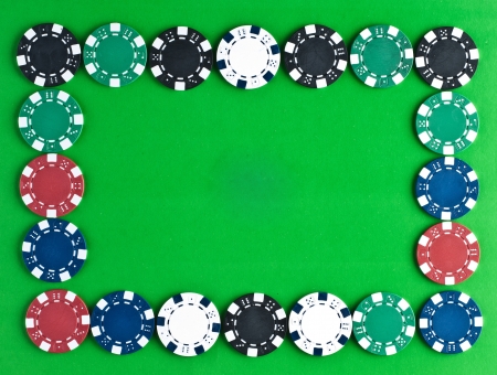 Counters for game in a casino on green a backgroundの写真素材