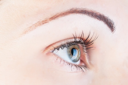 beautiful human eye and contact lensの写真素材