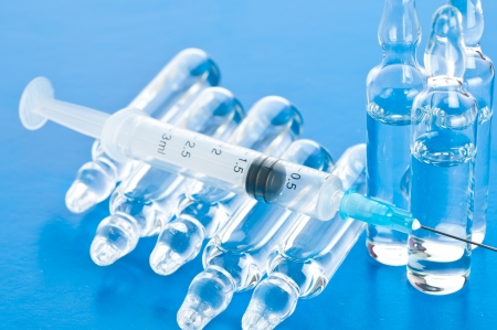 medicine vials and syringeの写真素材