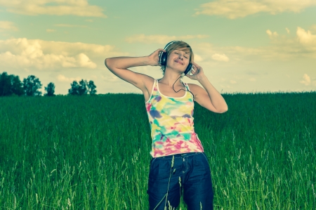 young woman with headphonesの写真素材