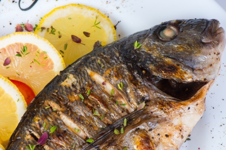 fish, sea bass grilled with lemonの写真素材