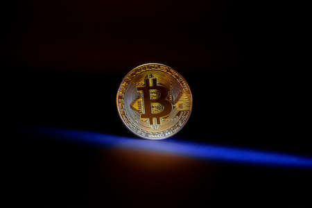 Bitcoin. Black and white photo. Cryptocurrency. Coin. Bitcoin coin. Cryptocurrency exchange. Blue