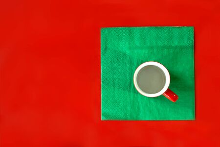 red background in the style of minimalism with a mug of coffeeの写真素材