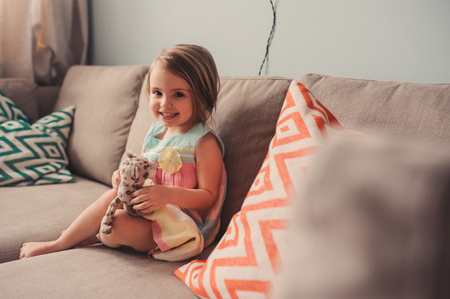 cute toddler girl relaxing at homeの写真素材
