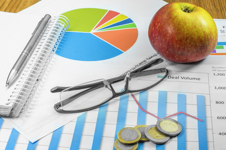 business documents glasses graphics handle apple coinsの写真素材