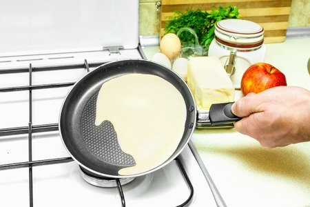 in the kitchen cooking pancakes batter ingredientsの写真素材