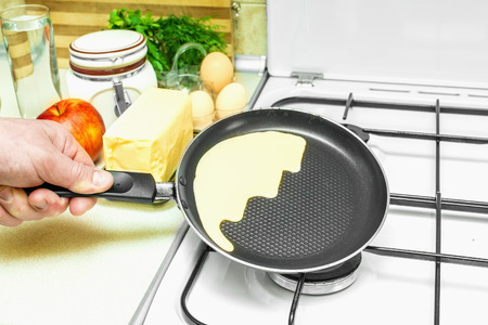 in the kitchen cooking pancakes batter ingredientsの写真素材