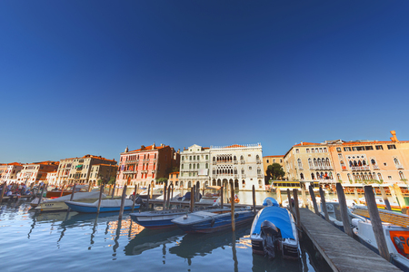 Grand Canal in Venice on a sunny day in front boat cloudless skyの写真素材
