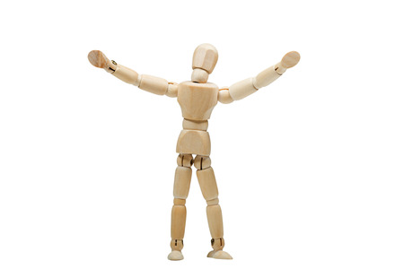 Wooden man practices yoga workout, isolated white backgroundの写真素材