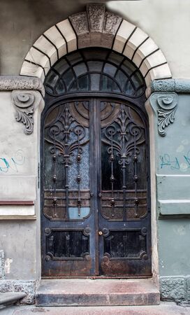 Modern metal door in old town of Riga, Latviaの写真素材
