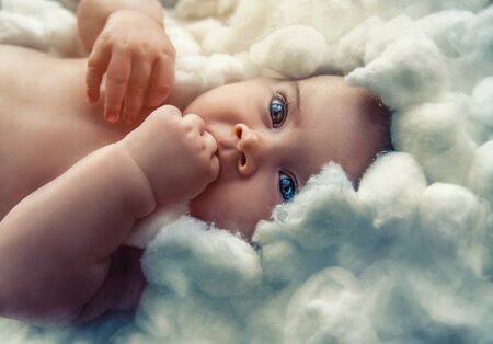 baby angel watchin in your eyesの写真素材