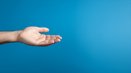 hand of businessman or investor in blue background copy spaceの素材
