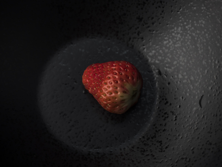 strawberry close up view on dark backgroundの写真素材