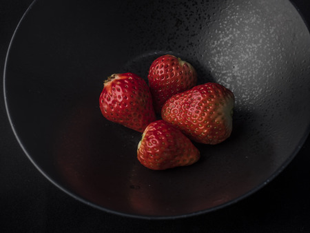 strawberry close up view on dark background