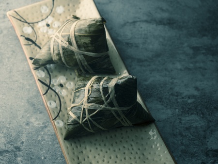 Close up view of chinese rice dumpling on a plateの写真素材