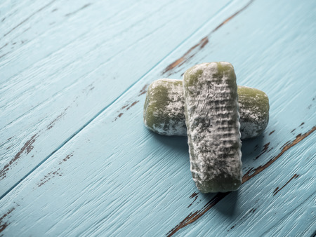 Matcha Mochi on blue wooden backgroundの写真素材