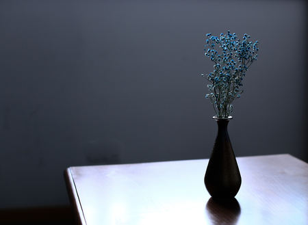 Flower pot on wooden deskの写真素材