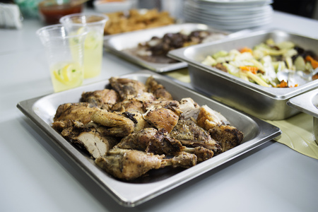 Close up view of delicious spicy fried chicken served in a party.の写真素材