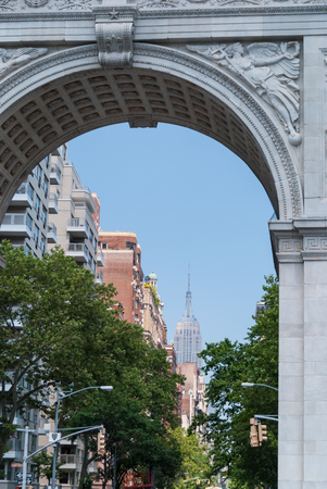 Empire State Building viewed through the Washington Square archの写真素材