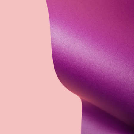 Violet and light pink abstract shape forming a colorful square wallpaper. Minimal vibrant backgroundの写真素材