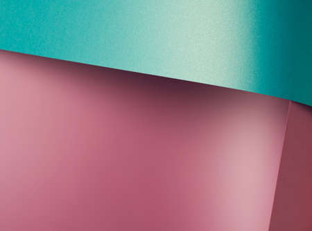 Purple pink and metallic blue background formed by two tone sheet paper. Minimal colorful abstract backdropの写真素材
