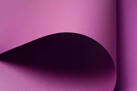 Violet curved shapes forming bold abstract background. Minimal purple backdropの写真素材
