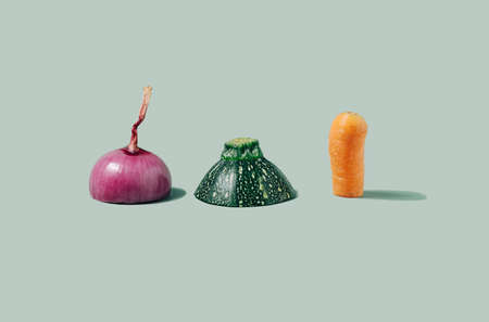 Plant ingredients layout on a pastel green background. Fresh vegetables minimal concept.の写真素材