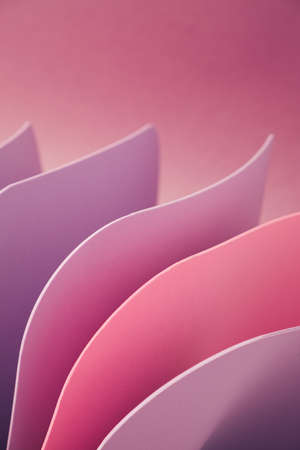 Lavender and pink curved sheets abstract wallpaper. Business pastel background.の写真素材