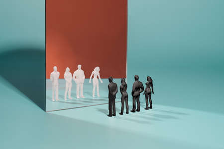 Black and white human mannequins reflecting in the mirror. Diversity, tolerance minimal conceptの写真素材