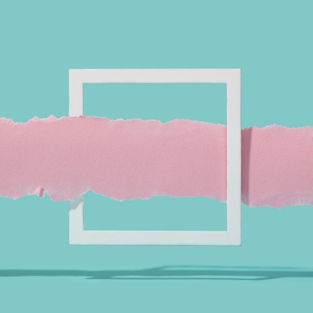 Torn pink paper strip going through white square frame. Retro copy space background