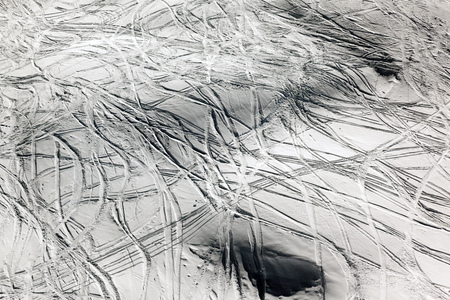 Ski marks on the snow covered mountains of Switzerland