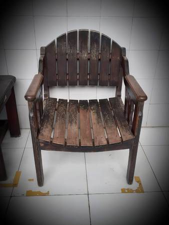 Old fashioned chair weathered with dark brown color - photoの写真素材